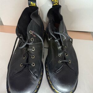 Dr. Martens Black Boots with Lace-Up Design and Rubber Sole